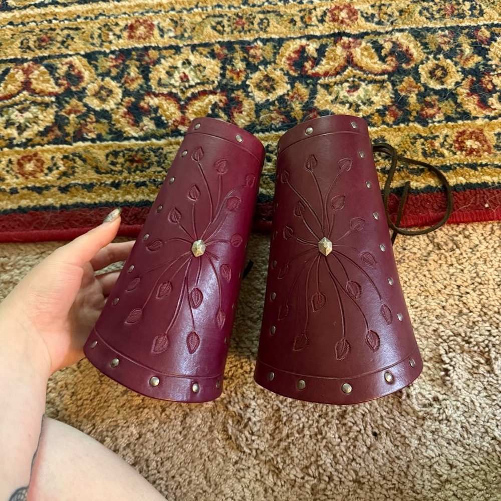 One of a kind purple tooled leather arm bracers
